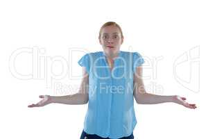 Female executive gesturing against white background