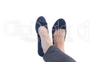 Female executives legs crossed at ankle