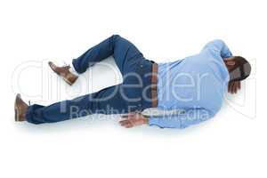 Male executive sleeping on white background