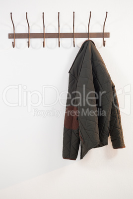 Close-up of warm cloth hanging on hook