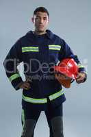 Fireman standing with hand on hip