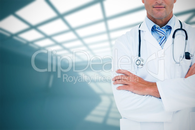 Composite image of serious doctor looking at camera