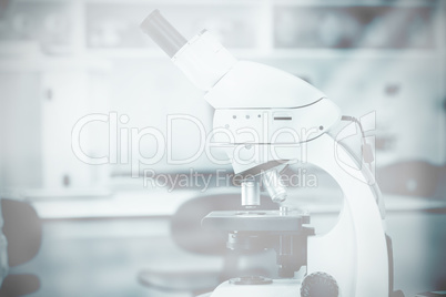 Composite image of microscope in laboratory