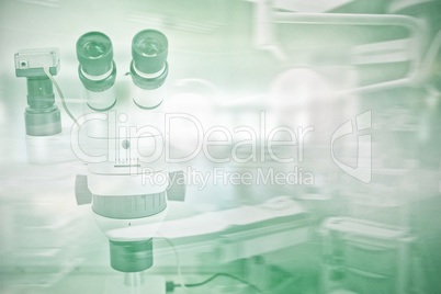 Composite image of microscope in laboratory