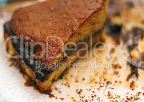 leftover cake with chocolate cream and crumbs