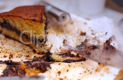 leftover cake with chocolate cream and crumbs