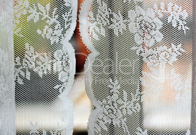 decorated curtains with white floral texture