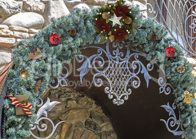 Beautiful decoration of the entrance to the house for Christmas.