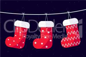 Christmas stocking hanging from a thread