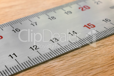 A fragment of metal measuring ruler.