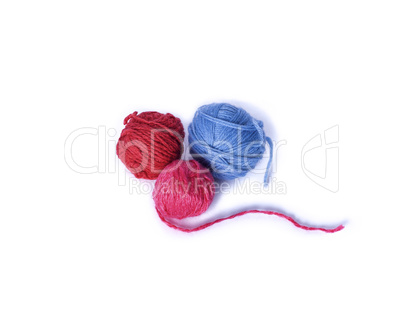 three multicolored woolen tangle for knitting