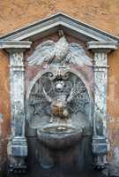 A drinking fountain in Rome .
