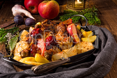 Chicken pieces with fruit and vegetables