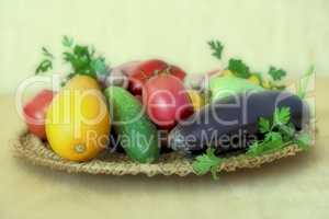 Various vegetables on a wicker dish on the table.