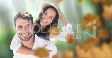 Couple in forest with leaves