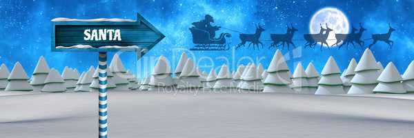 Santa text on Wooden signpost in Christmas Winter landscape and Santa's sleigh and reindeer's