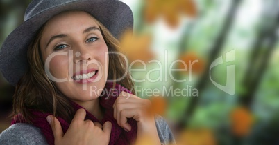 Woman's face in forest with leaves