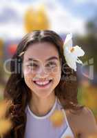 Woman's face in nature with flower head-piece