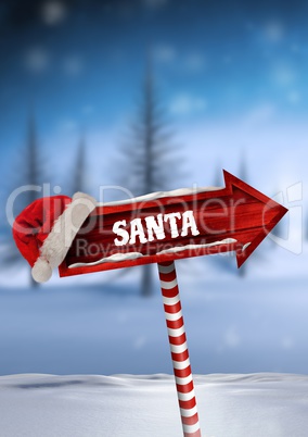 Santa text on Wooden signpost in Christmas Winter landscape with Santa hat