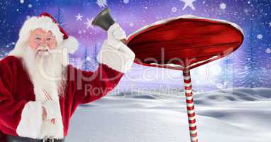 Santa holding a bell and Wooden signpost in Christmas Winter landscape