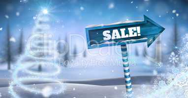 Sale text and Wooden signpost in Christmas Winter landscape