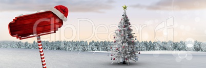 Wooden signpost in Christmas Winter landscape and Santa hat with Christmas tree