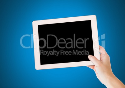 Hand holding tablet with blue background