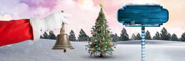 Santa holding bell and Wooden signpost in Christmas Winter landscape with Christmas tree
