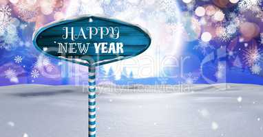 Happy New Year text on Wooden signpost in Christmas Winter landscape