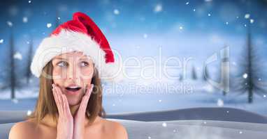 Amazed female Santa in Christmas Winter landscape