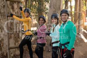 Friends standing together in park