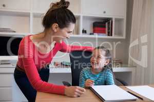 Mother and daughter interacting with each other