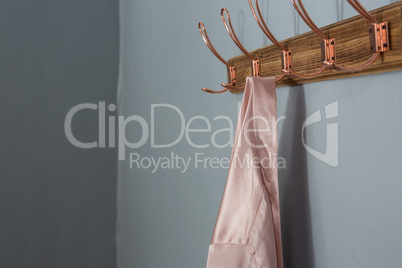 Apron hanging on hook