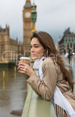 Woman Drinking Coffee on Westminster Bridge, Big Ben, London, En