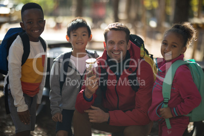 Happy teacher and kids