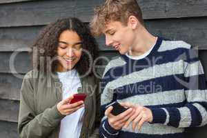 Boy Girl Male Female Teenagers Using Cell Phone