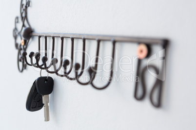 Close-up of keys hanging on hook