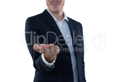 Businessman pretending to hold an invisible object