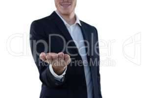 Businessman pretending to hold an invisible object