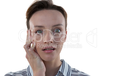 Female executive standing against white background