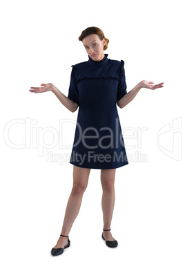 Female executive gesturing against white background