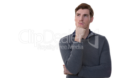 Male executive standing against white background