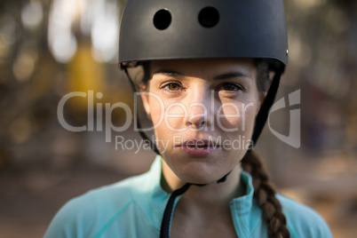 Beautiful woman looking at camera in park