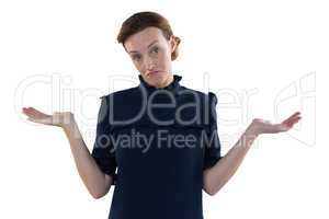 Female executive gesturing against white background