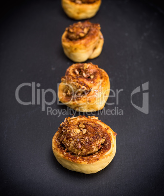 round buns with cinnamon and nuts