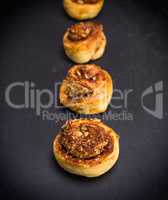 round buns with cinnamon and nuts