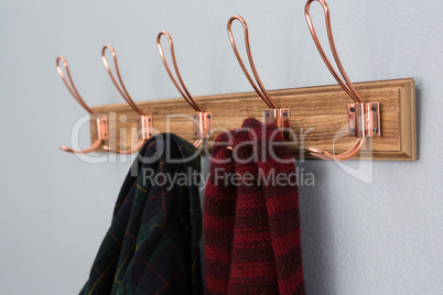 Warm clothing hanging on hook