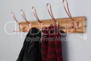 Warm clothing hanging on hook