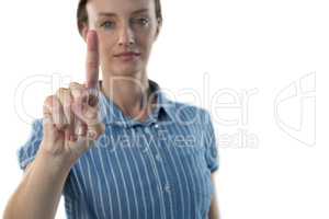 Female executive pretending to use an invisible screen