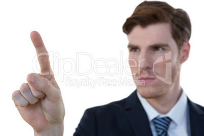 Businessman pretending to use an invisible screen